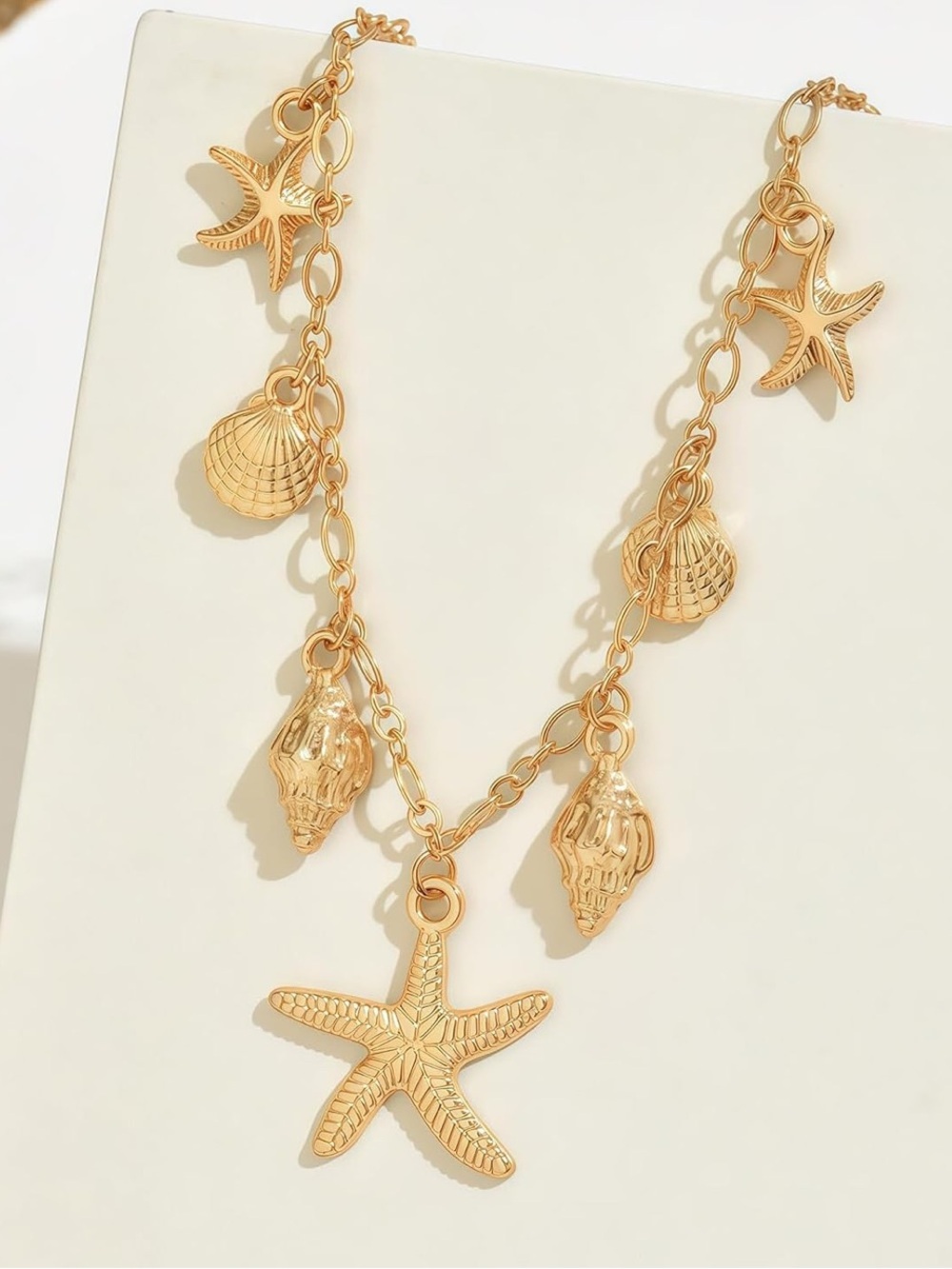 Anthropologie Gold Seashell & Starfish Charm Necklace